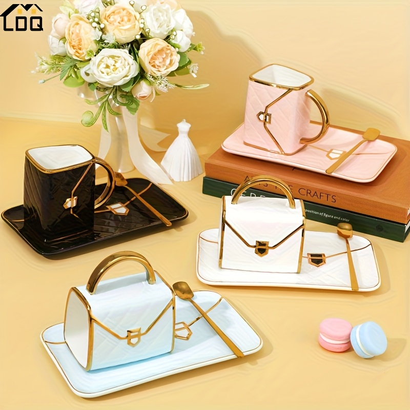 A Stylish Ceramic Coffee Cup That Comes with a Spoon And Saucer Set